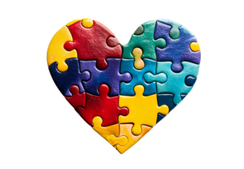 Colorful puzzle pieces coming together to form the shape of a heart on a white background,