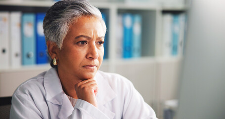 Doctor, woman and project in office, thinking or research for medical diagnosis, science or...
