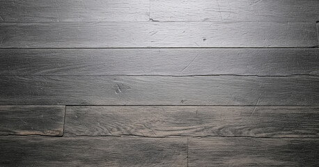 Dark wooden panels featuring natural grain, subtle scratches, and light wear marks create an authentic rustic background with rich black tones and soft sheen.