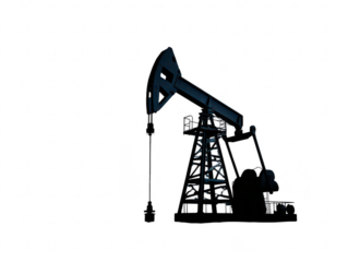 Silhouetted oil pump jack at night