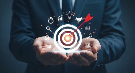 Businessman presenting a target with an arrow hitting bullseye representing business goals