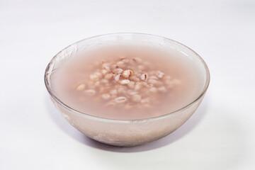 Job's tears soup in glass bowl
