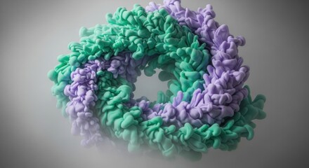 A close up shot of a swirling cloud of green and purple ink in water against a grey background space 100