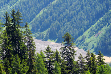 Aerial view of rockfall with gravel and Lonza River at Lötschental Valley in the Swiss Alps...