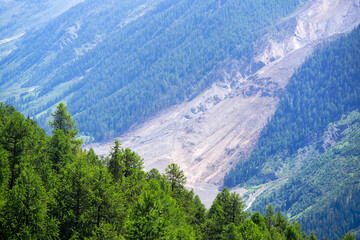 Aerial view of rockfall with gravel and Lonza River at L&ouml;tschental Valley in the Swiss Alps covering almost entire mountain village of Blatten. Photo taken June 19th, 2025, Wiler, Switzerland.