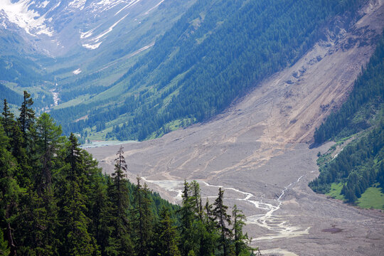 Aerial view of rockfall with gravel and Lonza River at L&ouml;tschental Valley in the Swiss Alps covering almost entire mountain village of Blatten. Photo taken June 19th, 2025, Wiler, Switzerland.