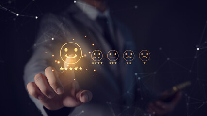 Customer service and satisfaction concept. Businessman touching smile icon screen.