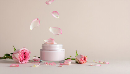 Close-up concept of natural cosmetics with flowers on a bright and soft background.