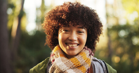 Portrait, happy and woman in woods, hiking and adventure for traveller in nature, holiday or...