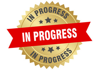 in progress. in progress round red and gold label isolated on transparent background