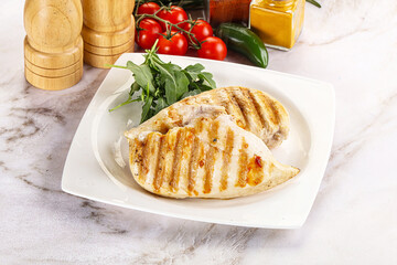 Grilled chicken breast served arugula