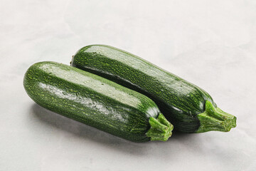 Raw green ripe zucchini vegetable