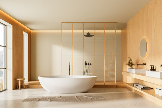 Modern minimalist bathroom interior with freestanding tub, wood accents, and glass shower wall in soft natural tones and ambient lighting design. 3D Rendering