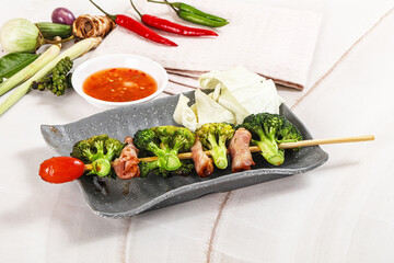 Thai Street foof satay with bacon and broccoli