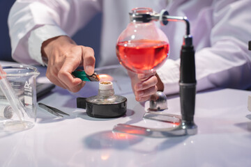 Close-Up of Laboratory Equipment with Flame in Scientific Experiment