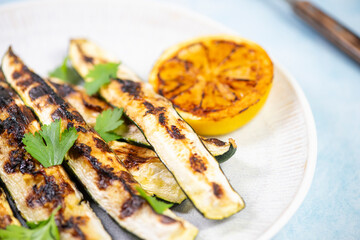 Grilled vegetables appetizer top view on round plate