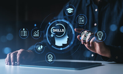 Human skills development and training concept with digital icons on dark background.