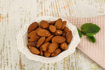 Tasty ripe almond nuts heap