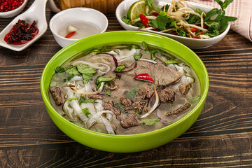 Vietnamese Pho Bo soup with beef and noodles