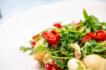 Calamari with salad and red peppers