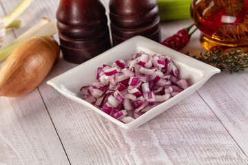 Diced red onion in the bowl