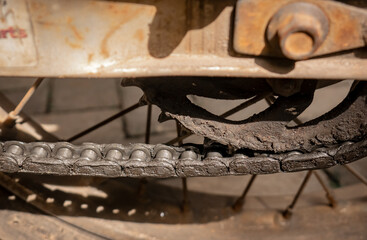 The old motorbike chain was not maintained so there was a lot of dry oil stuck to it