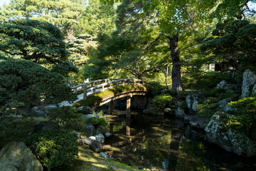 Traditional Japanese garden bridge in Kyoto Imperial Palace Japan