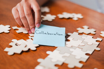 Collaboration action teamwork puzzle solving office environment engagement concept