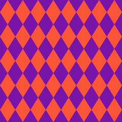 Seamless pattern for Halloween.Colorful harlequin repeat pattern in purple and orange.Geometric vector graphic abstract background.