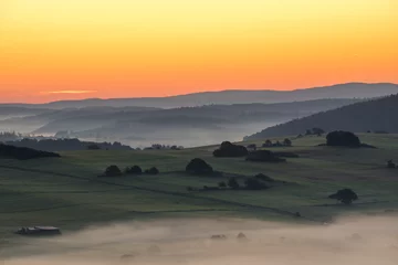 Fotobehang Goud Geel Morning landscape from the area called Struth near the german city Hallenberg  © Matthias