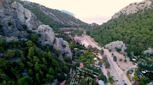 The scenic view of the ancient city of Olympos by drone

