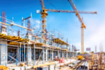 Blurred construction site with scaffolding outlines