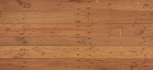 Realistic view of brown planks with strong grain contrast and dusty surface filled with signs of aging and organic surface wear.