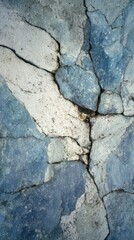 Obraz premium Abstract Blue and White Cracked Rock Surface Texture Background Natural Stone Pattern Ideal for Design Projects