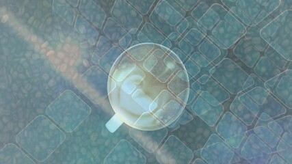 On play, mug rotating gently while grid panels drifting, light streaks highlighting foam texture - Powered by Adobe