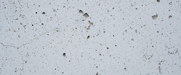 Decayed wall with layers of dirt and sun-bleached cracks exposing natural fractal patterns for high-resolution use in design or rendering.