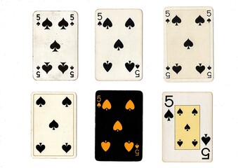 A vintage playing card in different designs isolated on a white background.