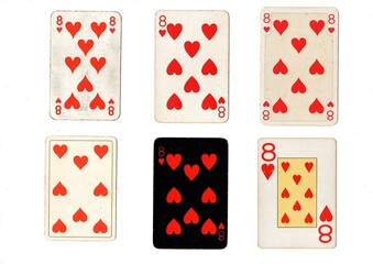 A vintage playing card in different designs isolated on a white background.
