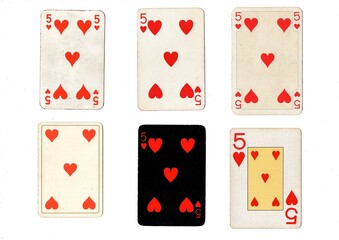 A vintage playing card in different designs isolated on a white background.