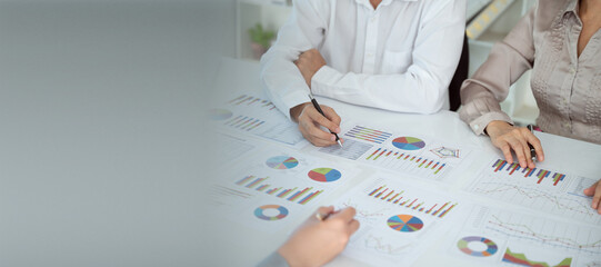 Business Analyst Team that has businessman and businesswomen are meeting brainstorm discussion and briefing about project new business and corporate reporting.