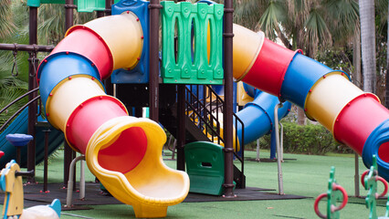 Colorful Playground Slide Equipment in Outdoor Park
