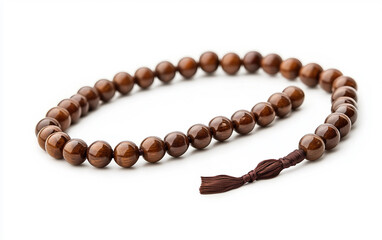 A wooden tasbih prayer bead string with 33 beads for Islamic meditation Isolated on white Background