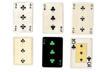 A vintage playing card in different designs isolated on a white background.