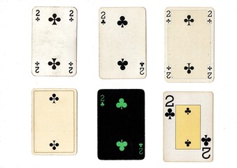 A vintage playing card in different designs isolated on a white background.