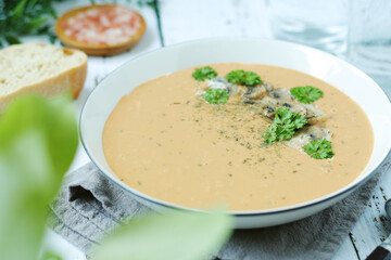A bowl with mushroom cream soup