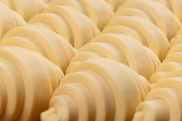 Puff pastry croissants ready to bake.
