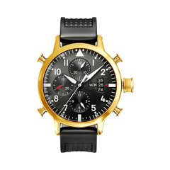 Close up of a gold and black chronograph watch with a black rubber strap on a white background