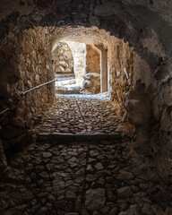 A maze of stone, cobbled, passageways connect the houses in the medieval hilltop village of Sant'Antonino in the Balage region of the Mediterranean island of Corsica