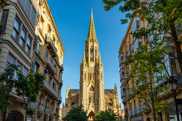 Fototapeta premium Main tower and bell tower of the Cathedral of the Good Shepherd in the Basque city of San Sebastian, Spain.