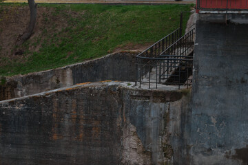 Dam of small hydroelectric power station, water discharge through locks